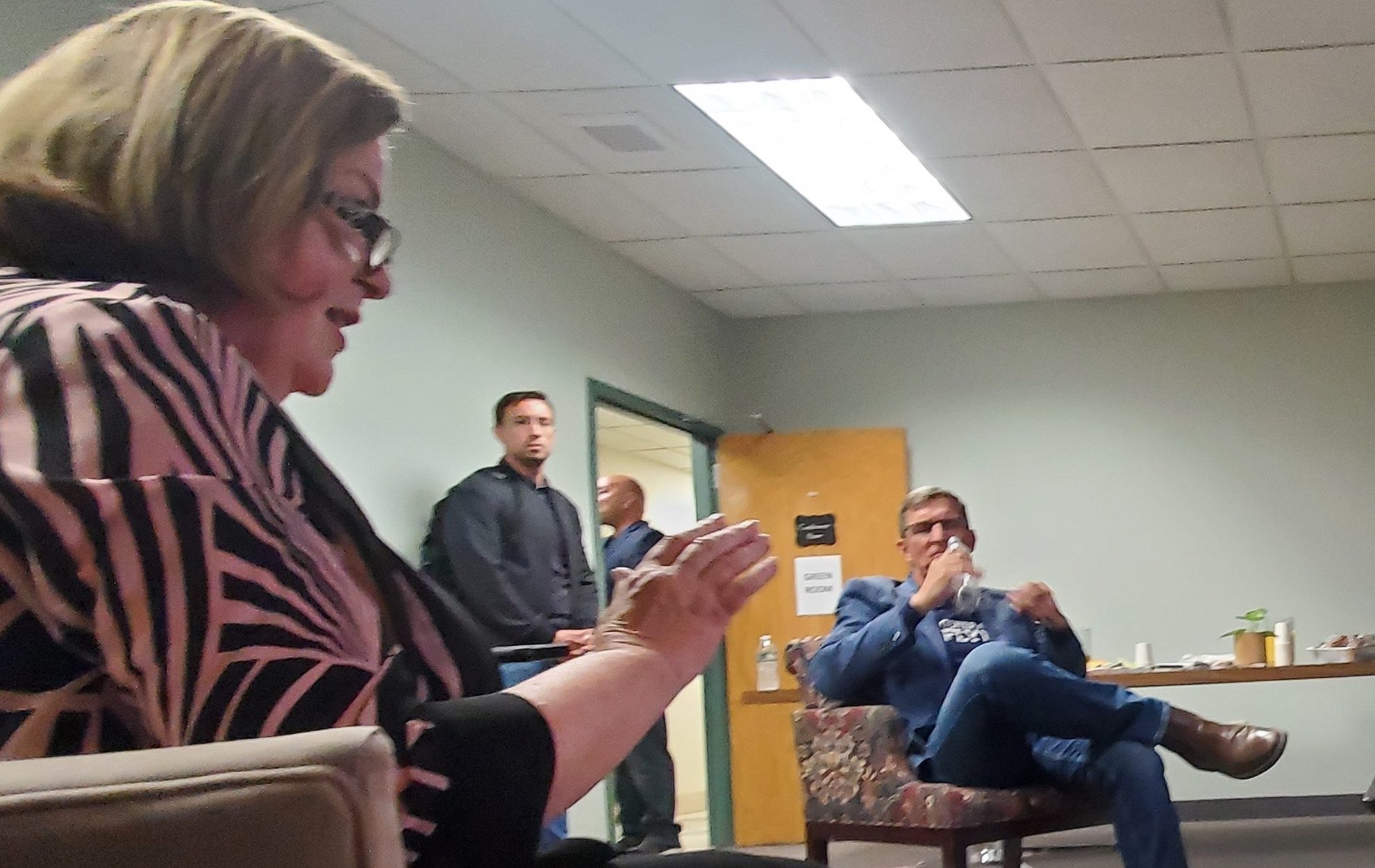 People interacting in a casual indoor setting.