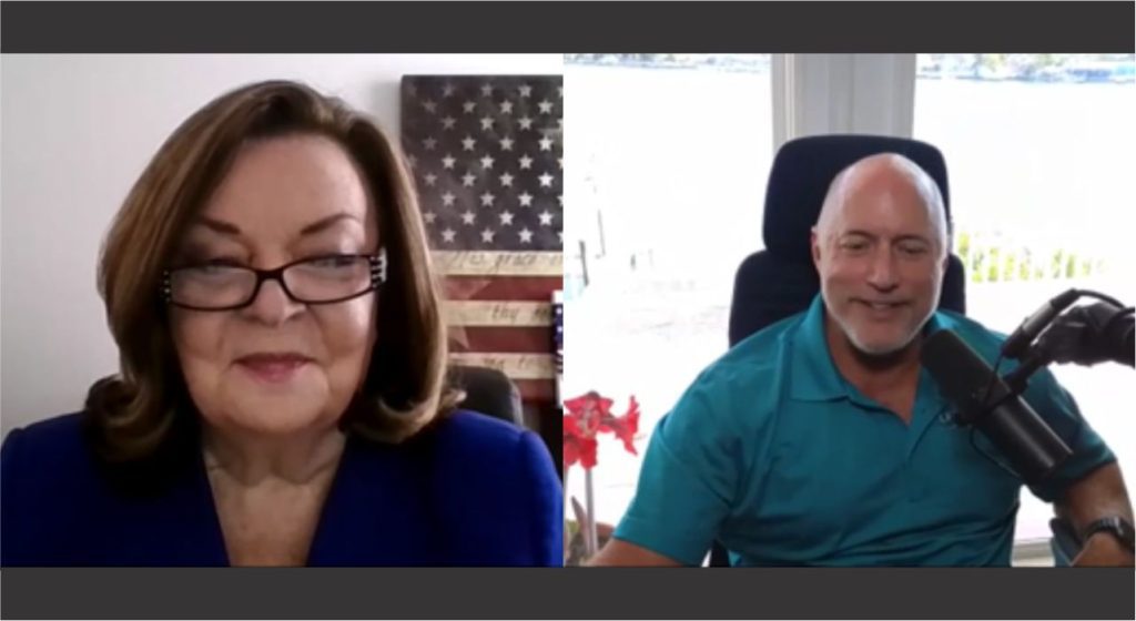 Two people engaged in a video call, smiling and interacting.